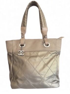 Chanel Paris-Biarritz Tote | Gold Nylon Canvas | CC Charm | Quilted